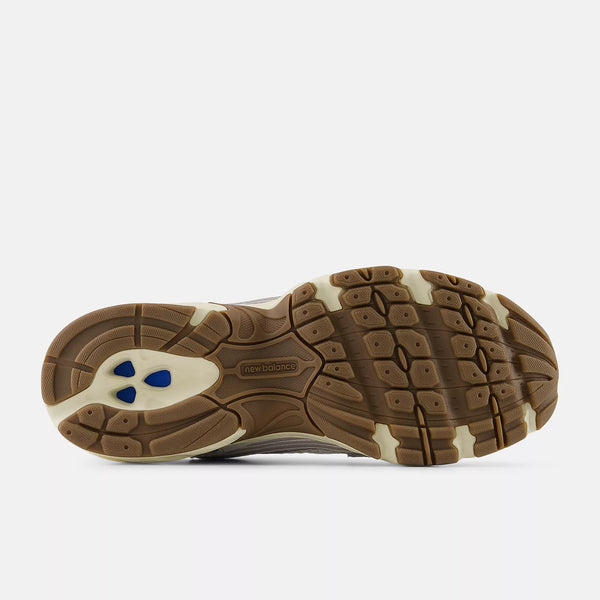 Close-up of a brown and beige shoe sole on a white background