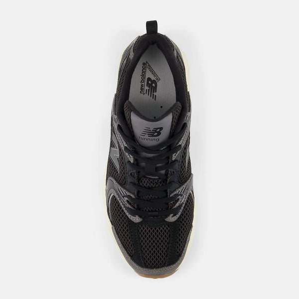 Top down look at a NB lifestyle shoe with black laces.