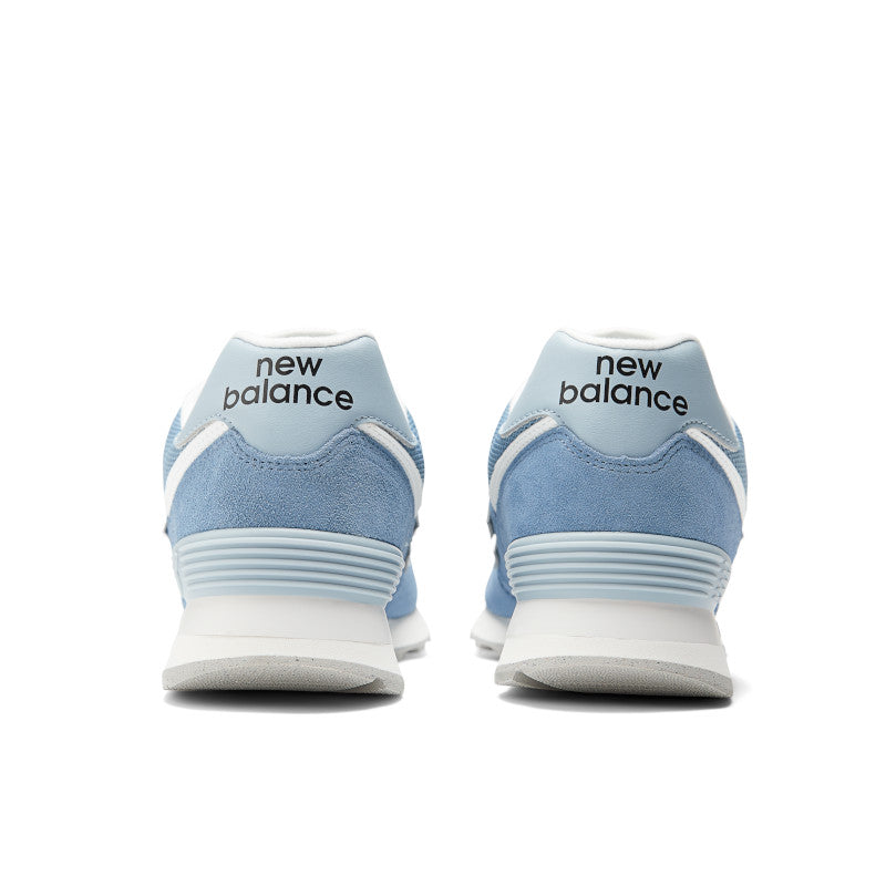 From behind the NB 574 the new balance words are written on the back of the heel collar