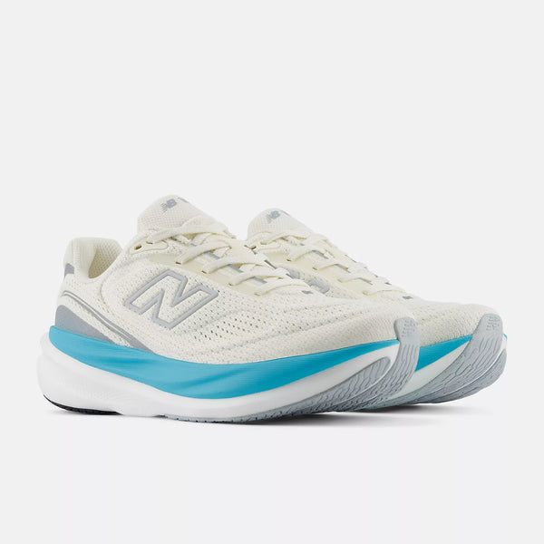 White running shoe with blue sole on a white background
