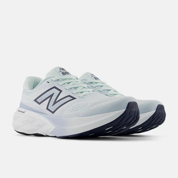 Light blue running shoe with New Balance logo on a white background