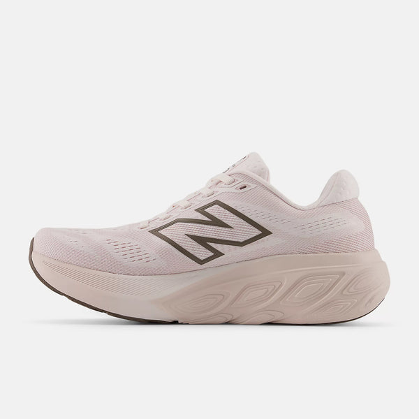 Light pink running shoe with New Balance logo on a white background