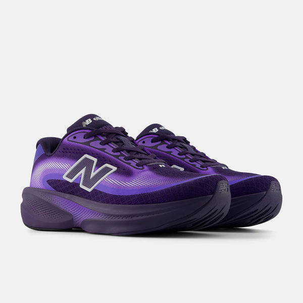 Purple running shoes with New Balance logo on a white background