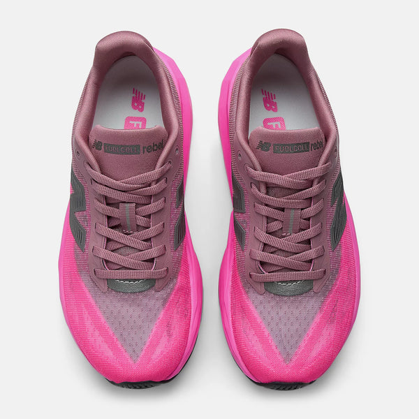 Pink and gray sneakers on a white background