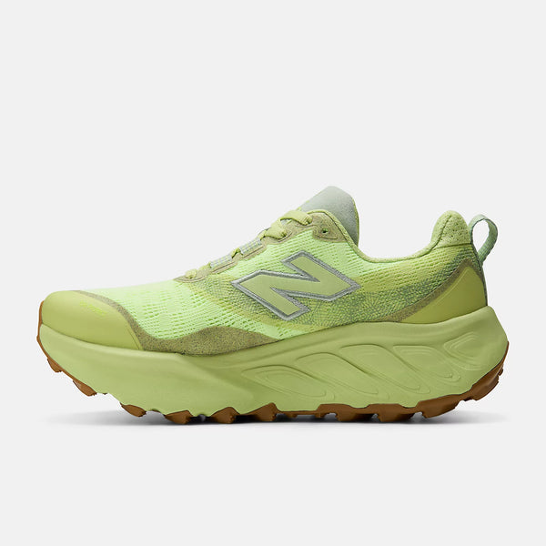 Green trail running shoe with 'N' logo on a white background