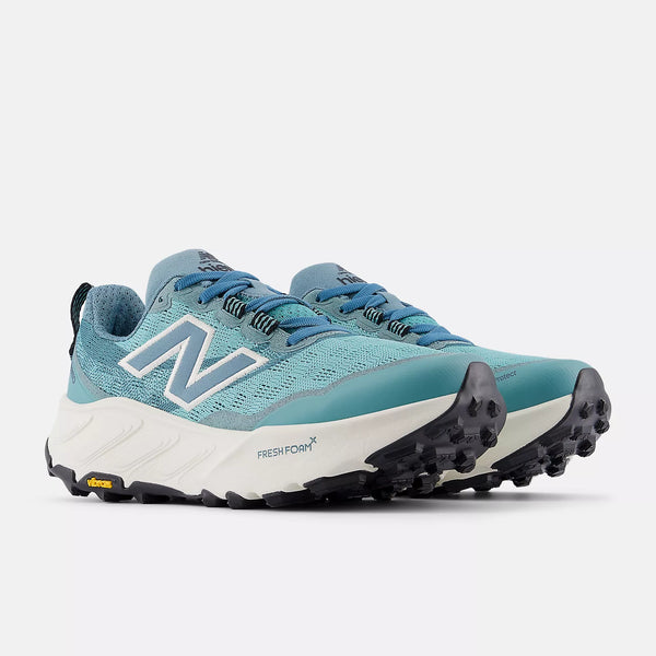 A pair of Women's NB Hierro V9 trail shoes with a Fresh Foam X midsole.