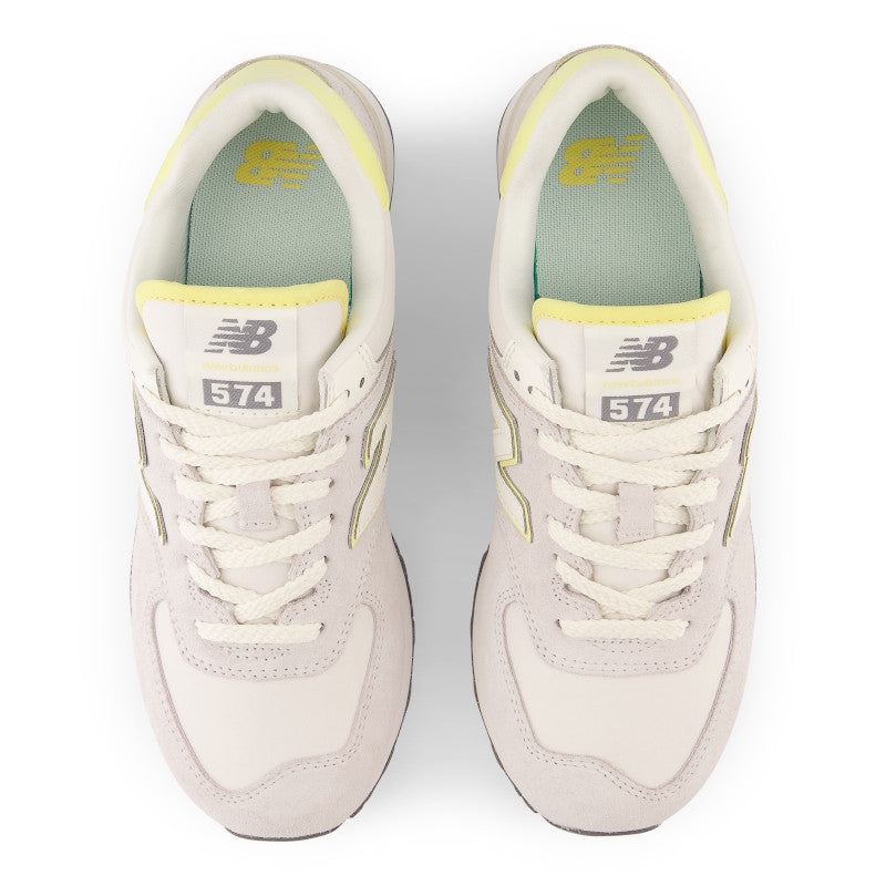 This 574 is almost all white with the exceptions of some very light yellow pops on the tongue and heel
