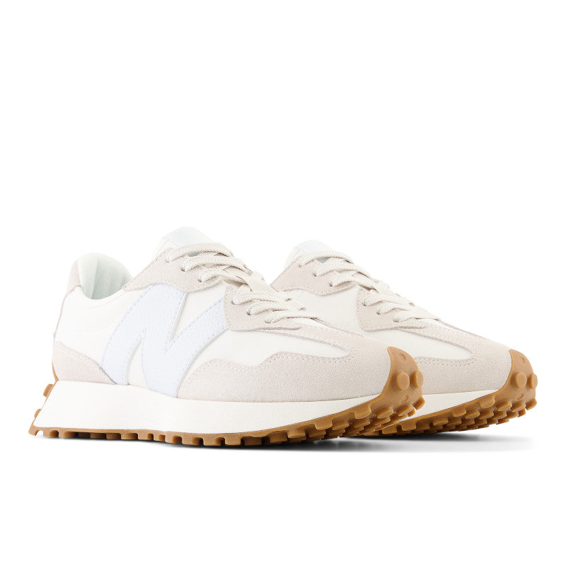 Both pair of the NB 327's pictured from a diagonal angle shoe off the the great colors of the upper against the gum sole rubber outsole