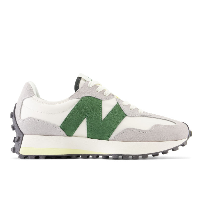 The lateral view of this women's 327 shows a big Green "N" on the shoe