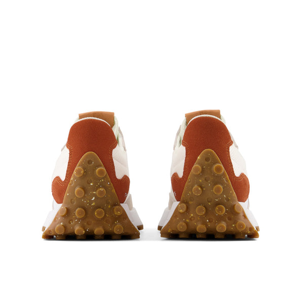 The speckled outsole of this shoe comes up high into the heel area