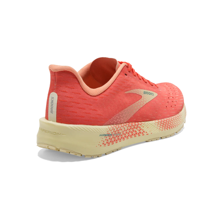 Back angled view of the Women's Hyperion Tempo by Brooks in the color Hot Coral/Flan/Fusion Coral