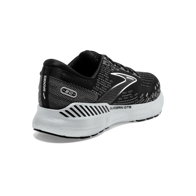 Back angled view of the Women's Glycerin GTS 20 by Brooks in the color Black/White/Alloy