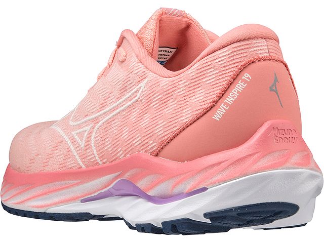 Back angled view of the Women's Wave Inspire 19 SSW by Mizuno in the color Peach Bud / Vaporous Grey