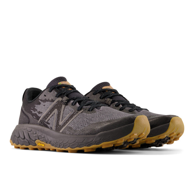 Front angle view of the Men's Hierro V7 trail shoe by New Balance in all black
