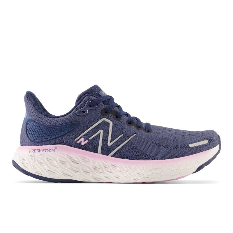 Lateral view of the Women's 1080 V12 by New Balance in the color Vintage / Indigo