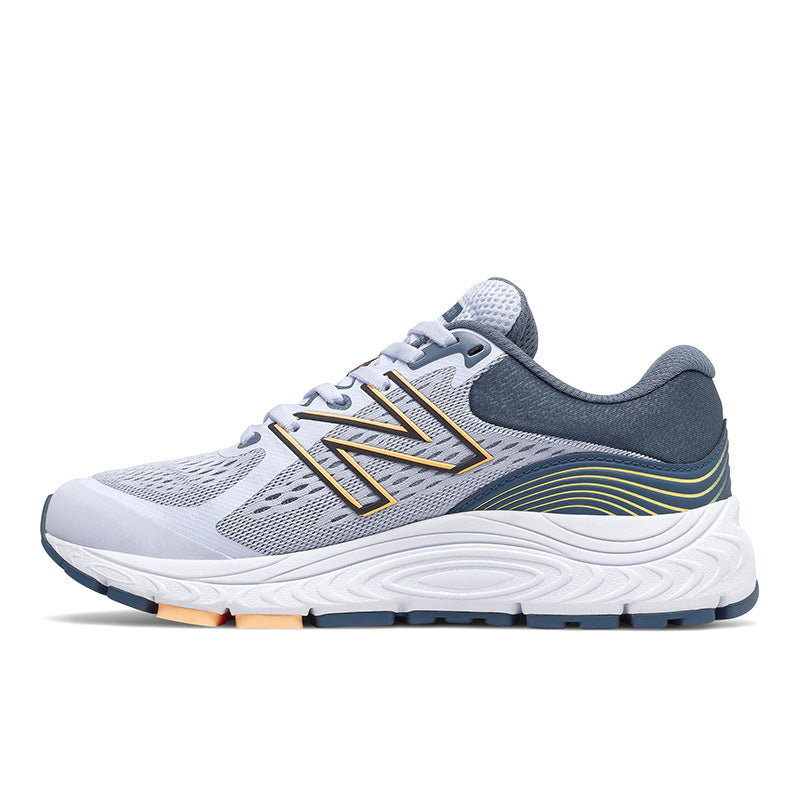 Medial view of the Women's 840 V5 by New Balance in the color Silent grey / Light mango