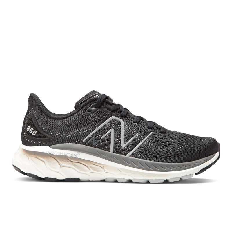 Lateral view of the Women's New Balance 860 V13 in the color Black/White/Castlerock