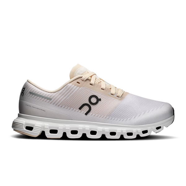 Light purple, cream and white training shoe on a white background
