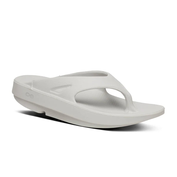 Very light grey thong sandal on a white background