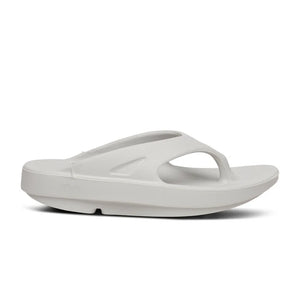 Very light grey thong sandal on a white background