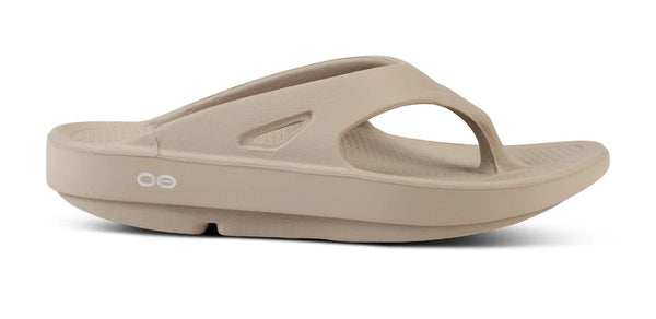 Beige thong sandal on a white background