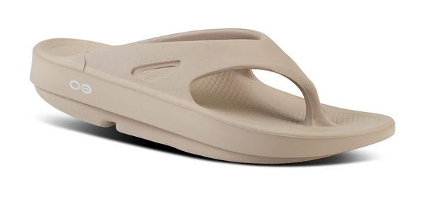 Beige thong sandal on a white background