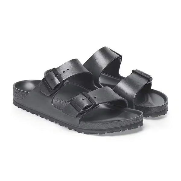 The upper of this shoe is two large straps with buckles on the lateral sides. 