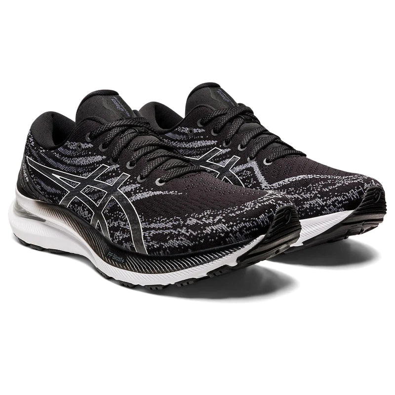 Front angle  view of the Men's Kayano 29 in the wide 2E width, color Black/White