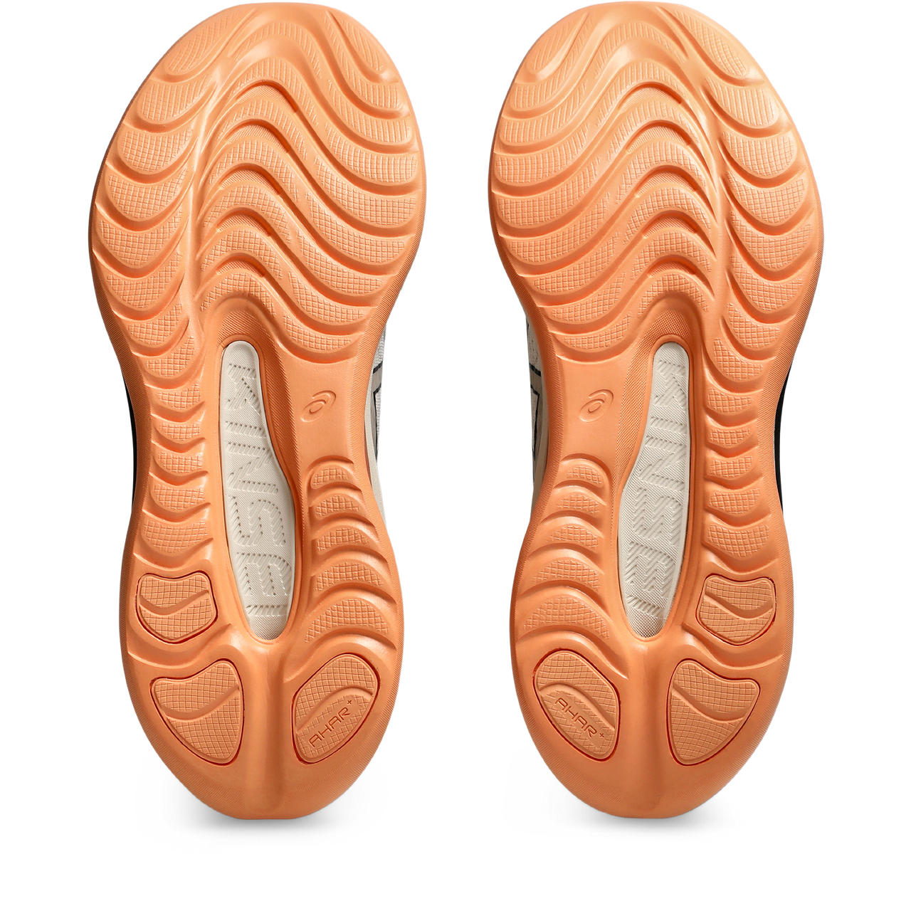 The outsole of this Kinsei max has a lot of midsole that goes right to the ground.  Only a few podds of rubber can be seen in the high abrasion heel area.  And these are even tonal