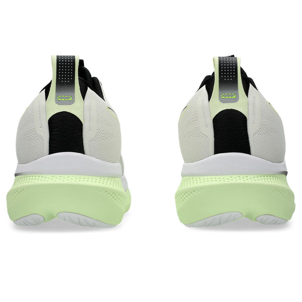The heel of this shoe has a black and green pull tab.