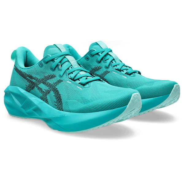 Turquoise running shoes with black accents on a white background