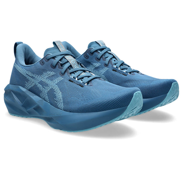 The lighter blue rubber on the outsole peaks through when looking at these shoes from the front.