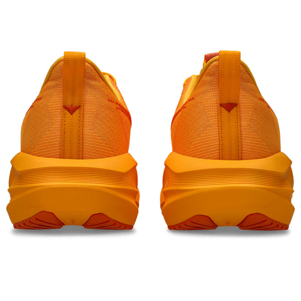 Orange athletic shoes shown from the back on a white background