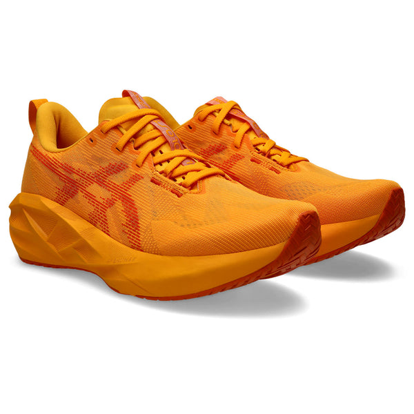 A pair of men's all orange ASICS running shoes.