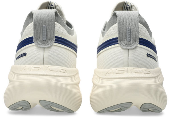 A navy blue band runs through the middle of the heel on this shoe.