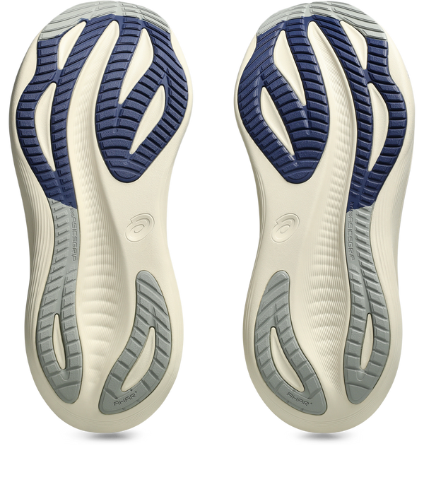 Navy blue and grey rubber is used on the outsole of this shoe. 