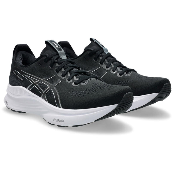This shoe features a black Asics logo with a white outline on both the medial and lateral sides. 