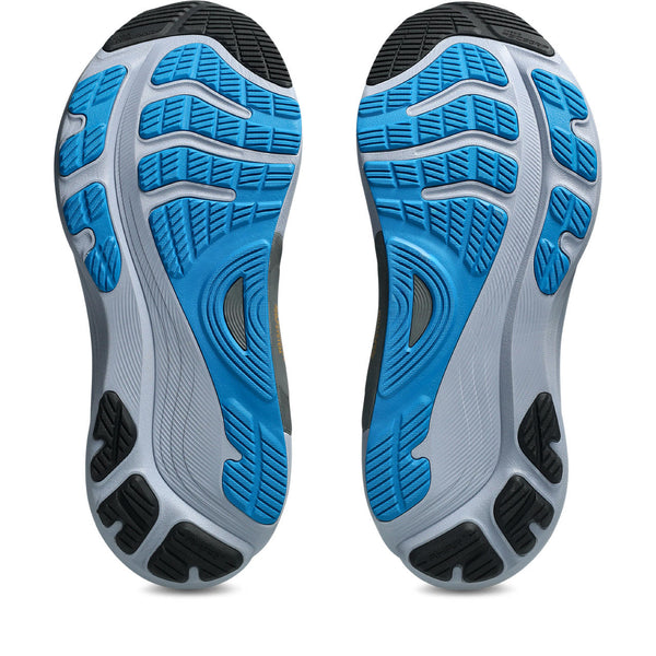 Close-up of a pair of running shoes with blue and gray sole design on a white background.