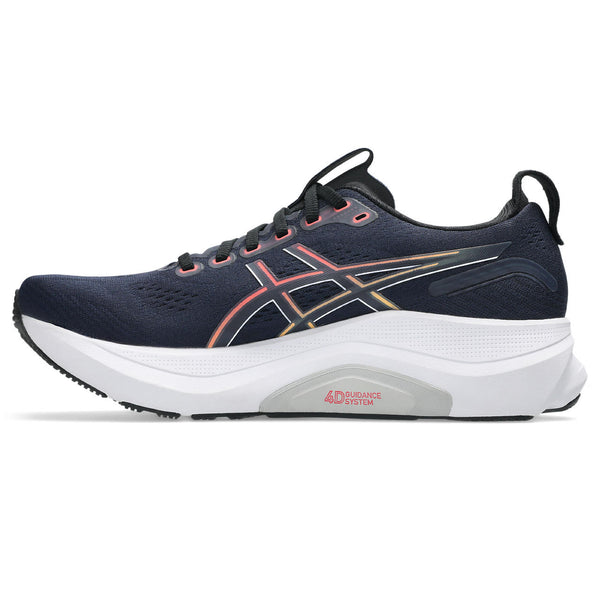 Medial side of a ASICS mens navy running shoe with white sole on a white background.
