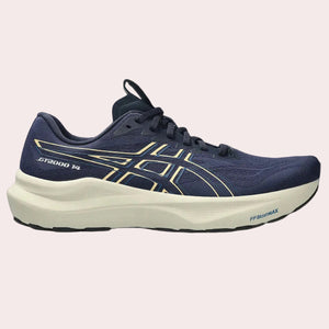 Navy running shoe with gold accents on a white background