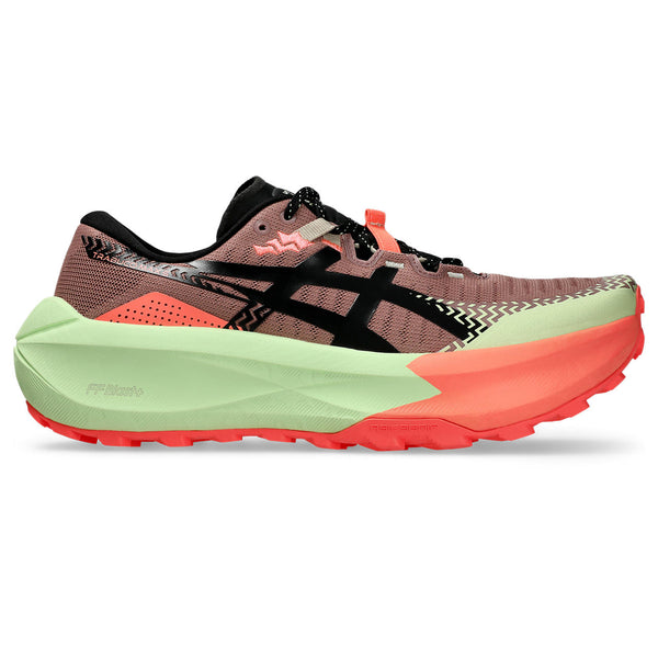 Multicolored running shoe with a green sole on a white background