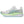 The top half of the midsole is light green while the bottom half is white. 