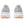 Gray athletic shoes with white soles and orange accents on a white background
