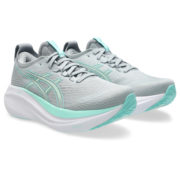 A teal Asics log is in the middle of the upper on both sides. 