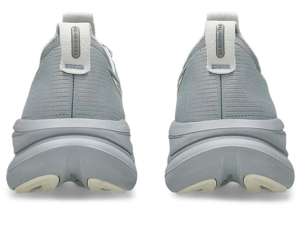Gray heel cup shoes with grey soles on a white background