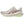 Beige running shoes with green accents on a white background