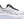 A white and pink running shoe for women from ASICS.