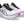 A pair of ASICS running shoes with black laces and a black tongue.