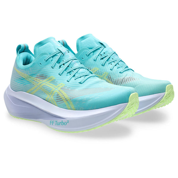 Turquoise running shoes with white soles on a white background