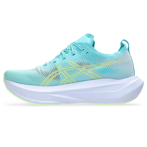Turquoise running shoe with white sole on a white background